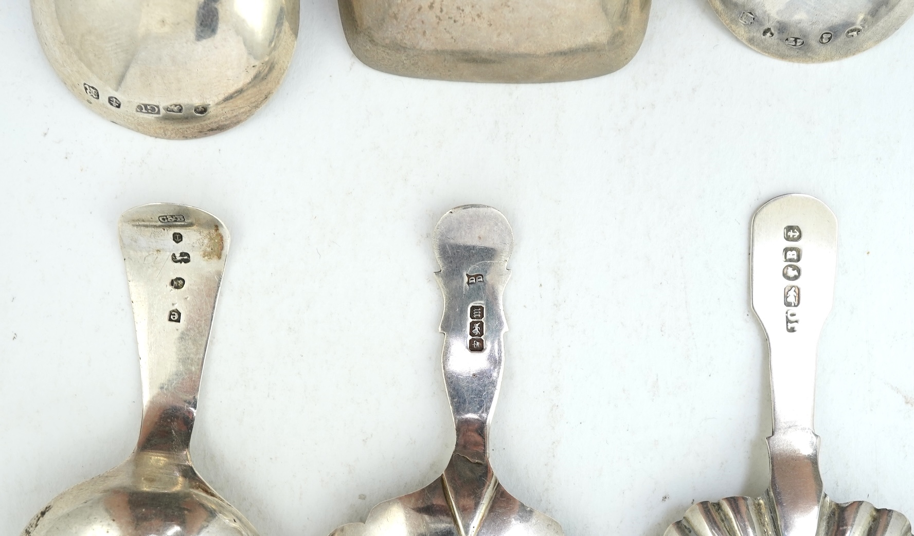 Ten assorted manly 19th century silver caddy spoons